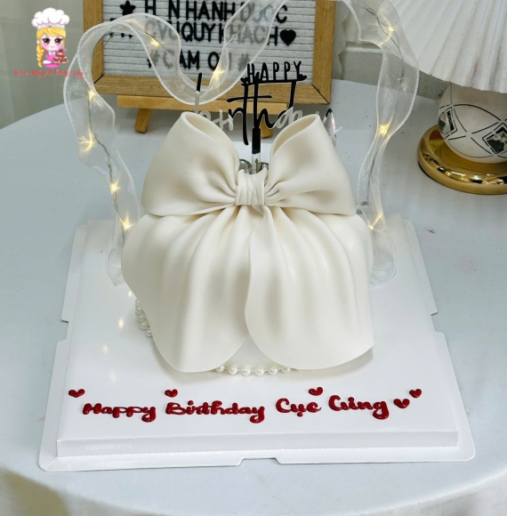 Bánh kem nơ tone trắng tại Tân Phú