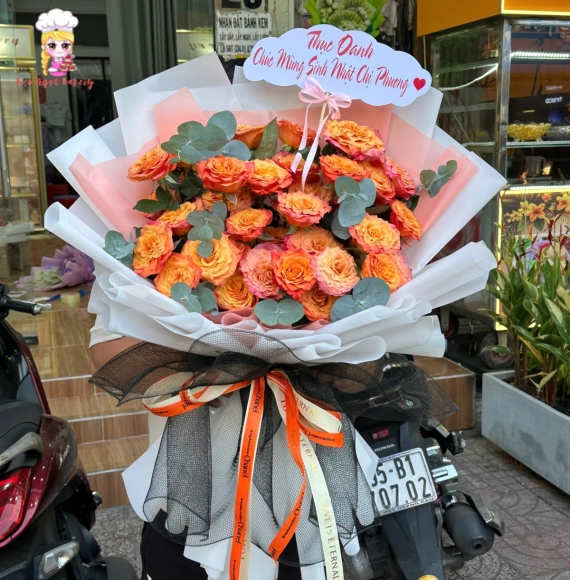 Bó hoa tươi tone cam giá rẻ bình dương