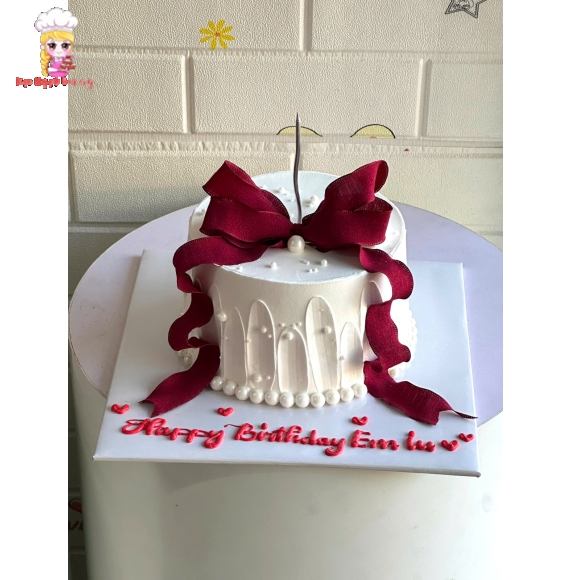 Bánh kem trái trang trí nơ hồng tặng em yêu
